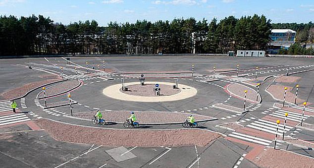 A Dutch-style roundabout (pictured above) prioritises pedestrians and cyclists