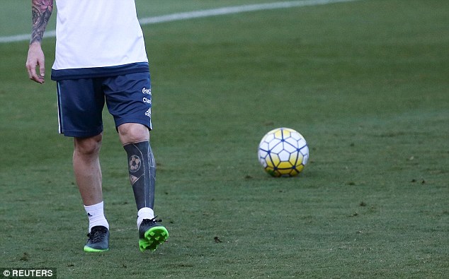 Messi has scrapped his old tattoos and instead had them coloured in with plain black ink