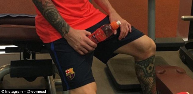 Four weeks ago Messi was showing off his bodywork - but it has now all been covered over