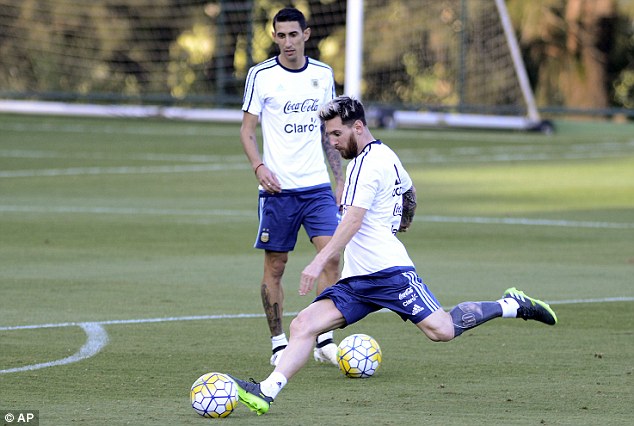 The Barcelona forward takes a strike towards goal during Argentina training on Tuesday