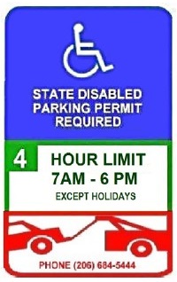 Designated disabled space with 4-hour time limit 7 AM - 6 PM